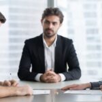Married couple signing papers_s