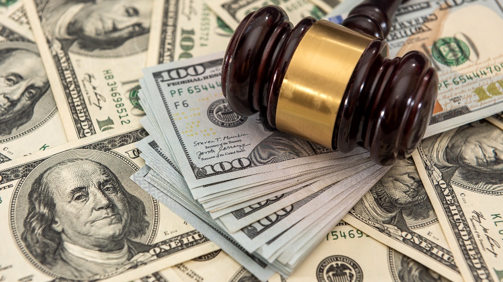 gavel with money under it
