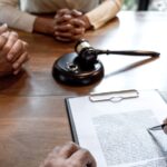 couple during divorce process with senior male lawyer_s