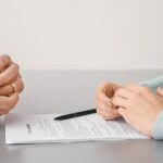 Couple with divorce decree in lawyer’s office_s