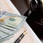 Wedding rings, judge gavel, dollar_s