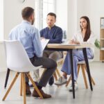 Angry clients submit customer complaint to bank worker_s
